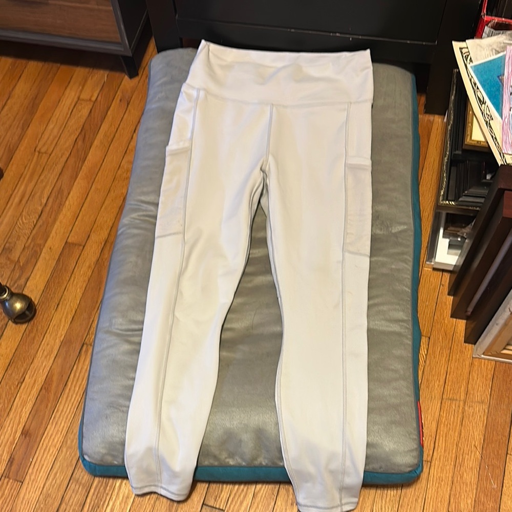 Fabletics Powerhold High-Waisted light blue/silverish leggings with side pockets